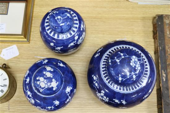 A Chinese ginger jar and cover and a similar matching pair (3)